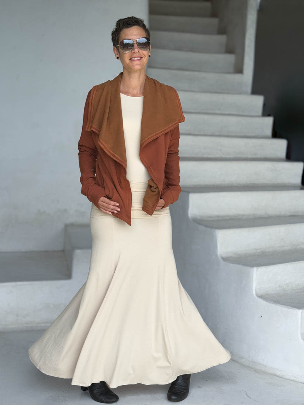 caraucci orange bamboo fleece jacket, shown open with a draped shawl color with thumbholes and pockets #color_copper