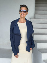 caraucci navy blue bamboo fleece jacket, shown open with a draped shawl color with thumbholes and pockets #color_navy