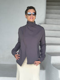 caraucci steel gray bamboo fleece jacket shown buttoned into a high cowl neck with thumbholes and pockets #color_steel