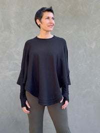 caraucci black bamboo cotton fleece oversized poncho with thumbholes #color_black