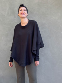 caraucci black bamboo cotton fleece oversized poncho with thumbholes #color_black