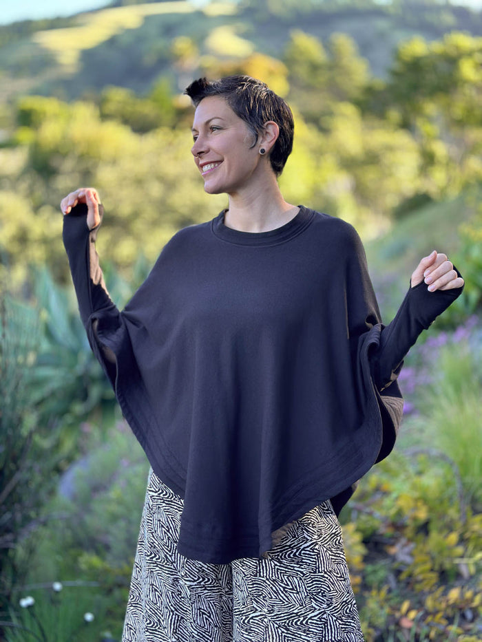 caraucci black bamboo cotton fleece oversized poncho with thumbholes #color_black