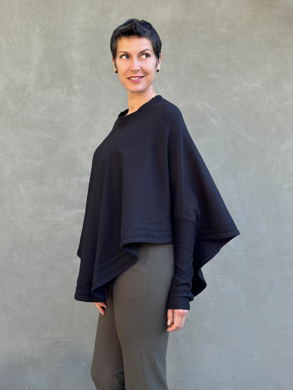 caraucci black bamboo cotton fleece oversized poncho with thumbholes #color_black