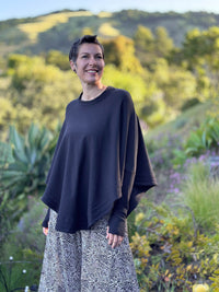 caraucci black bamboo cotton fleece oversized poncho with thumbholes #color_black