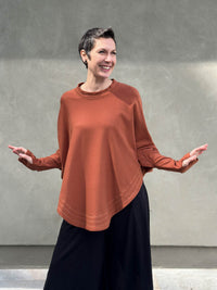 caraucci bamboo cotton fleece oversized poncho with thumbholes #color_copper