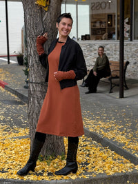 caraucci bamboo fleece orange sleeveless sweatshirt dress and tunic layered under bamboo black bomber jacket with fingerless gloves #color_copper