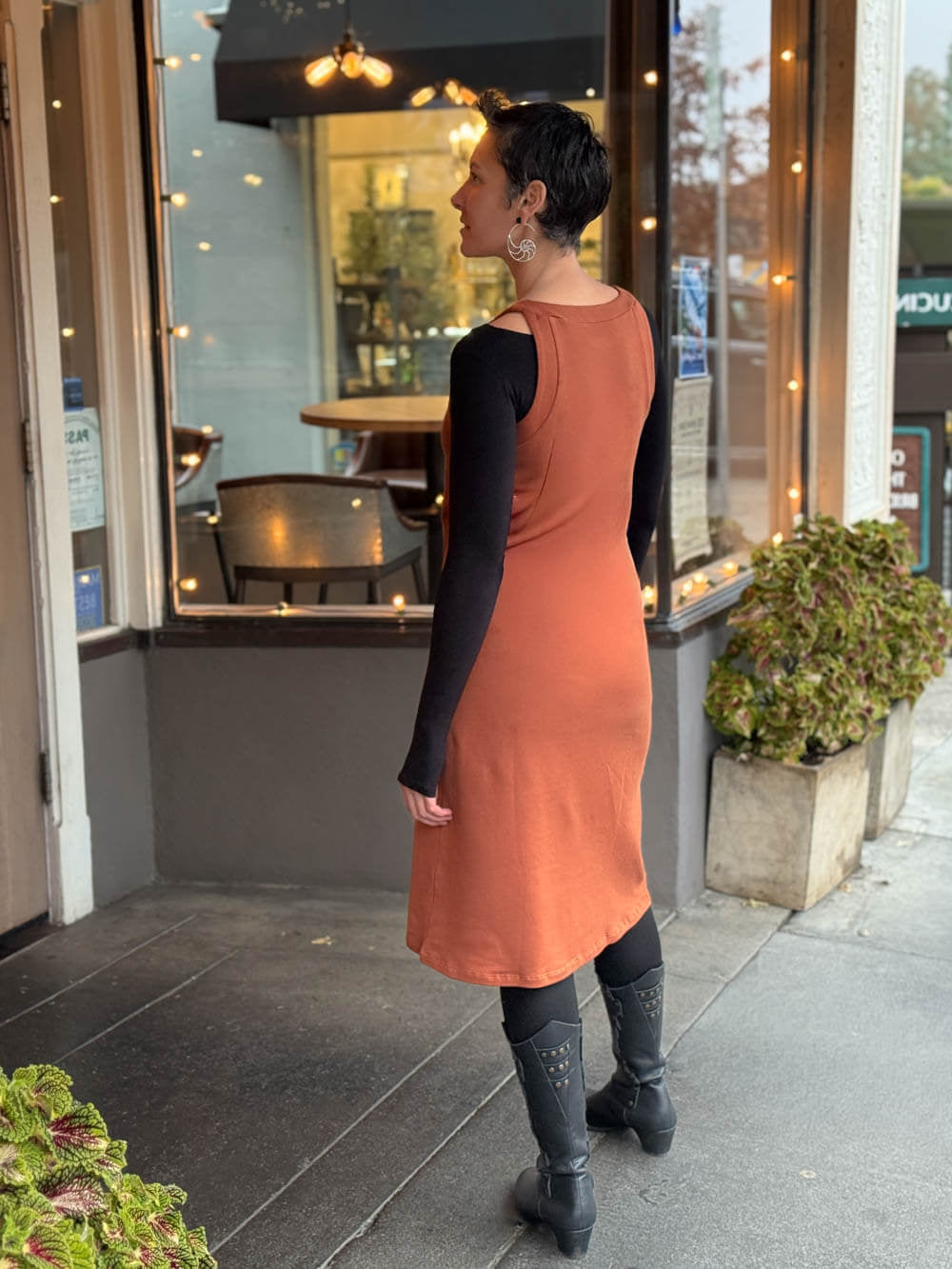 caraucci bamboo fleece orange sleeveless sweatshirt dress and tunic layered over black long sleeve boatneck top #color_copper