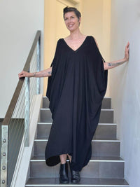 caraucci oversized black bamboo kaftan with open shoulders #color_black