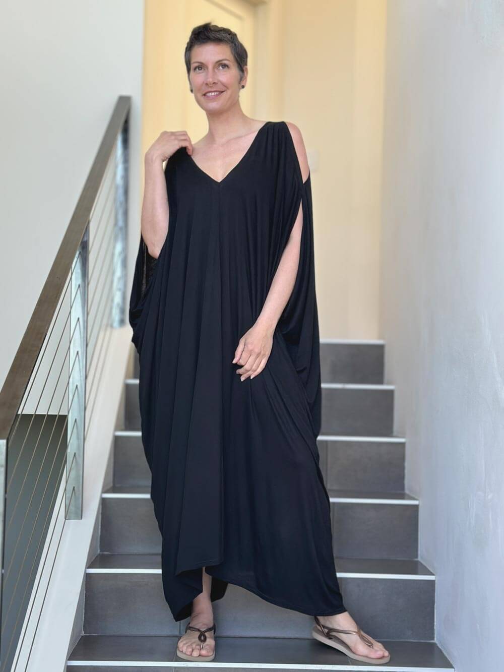 caraucci oversized black bamboo kaftan with open shoulders #color_black