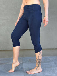 women's cotton lycra stretchy navy blue capri leggings with ruched knees and raised detail stitching #color_navy