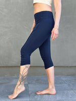 women's cotton lycra stretchy navy blue capri leggings with ruched knees and raised detail stitching #color_navy