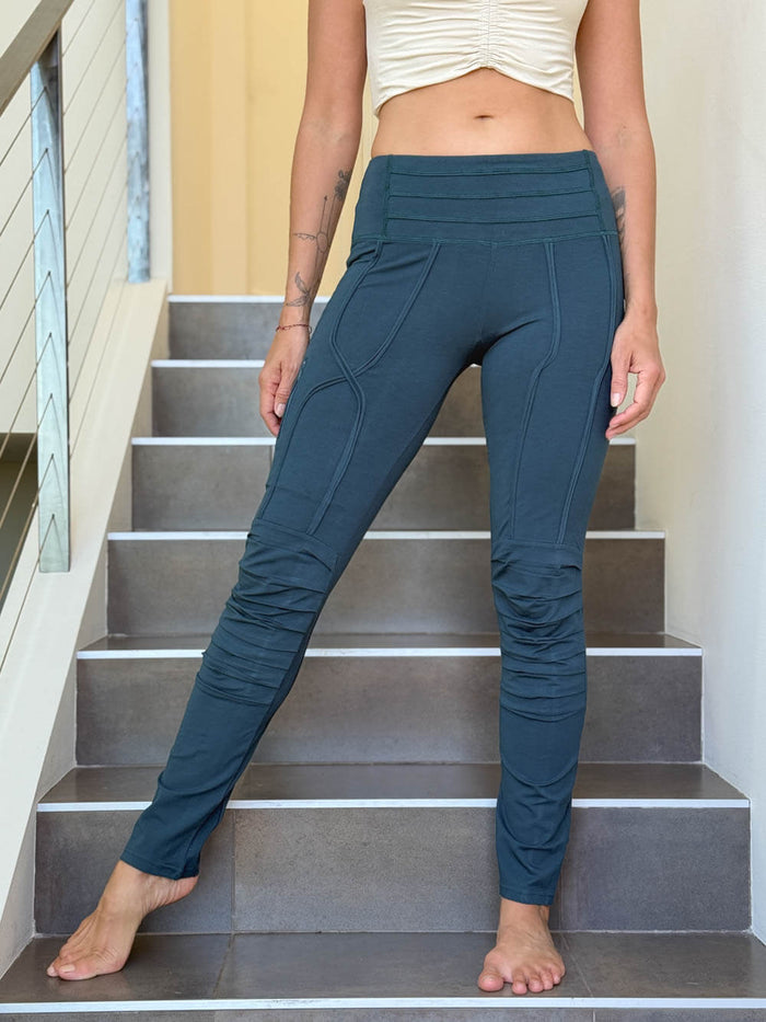 caraucci bamboo spandex teal blue legging pants with raised stitch details and 2 zipper pockets #color_teal