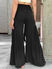 caraucci bella pants tiered wide leg black cotton jersey pants with adjustable waist tie #color_black
