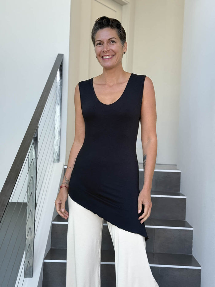 caraucci sleeveless scoop neck bias cut black asymmetrical hem tunic and white shrug #color_black