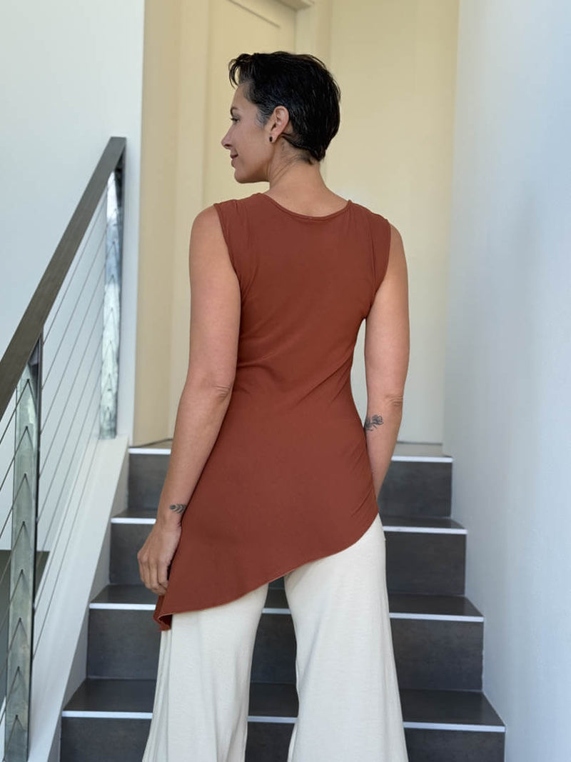 caraucci sleeveless scoop neck bias cut orange asymmetrical hem tunic #color_copper