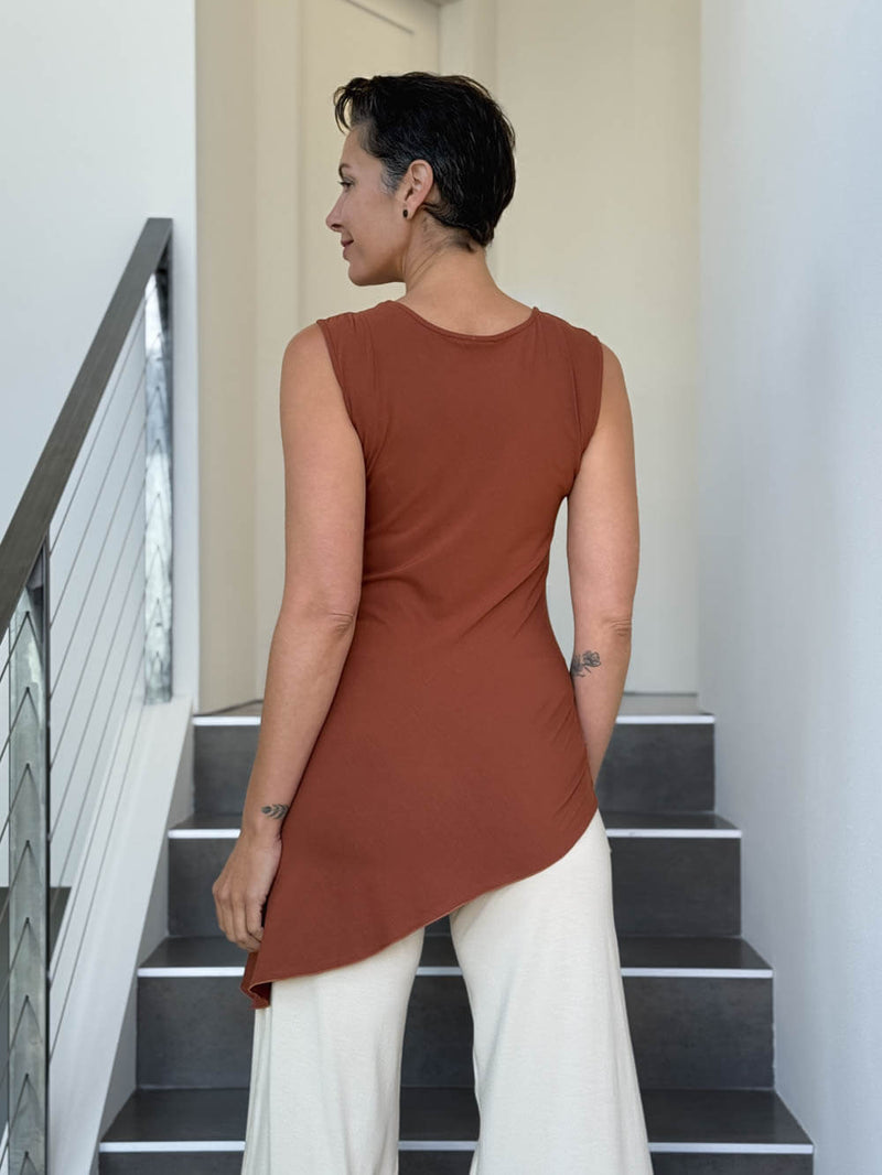 caraucci sleeveless scoop neck bias cut orange asymmetrical hem tunic #color_copper
