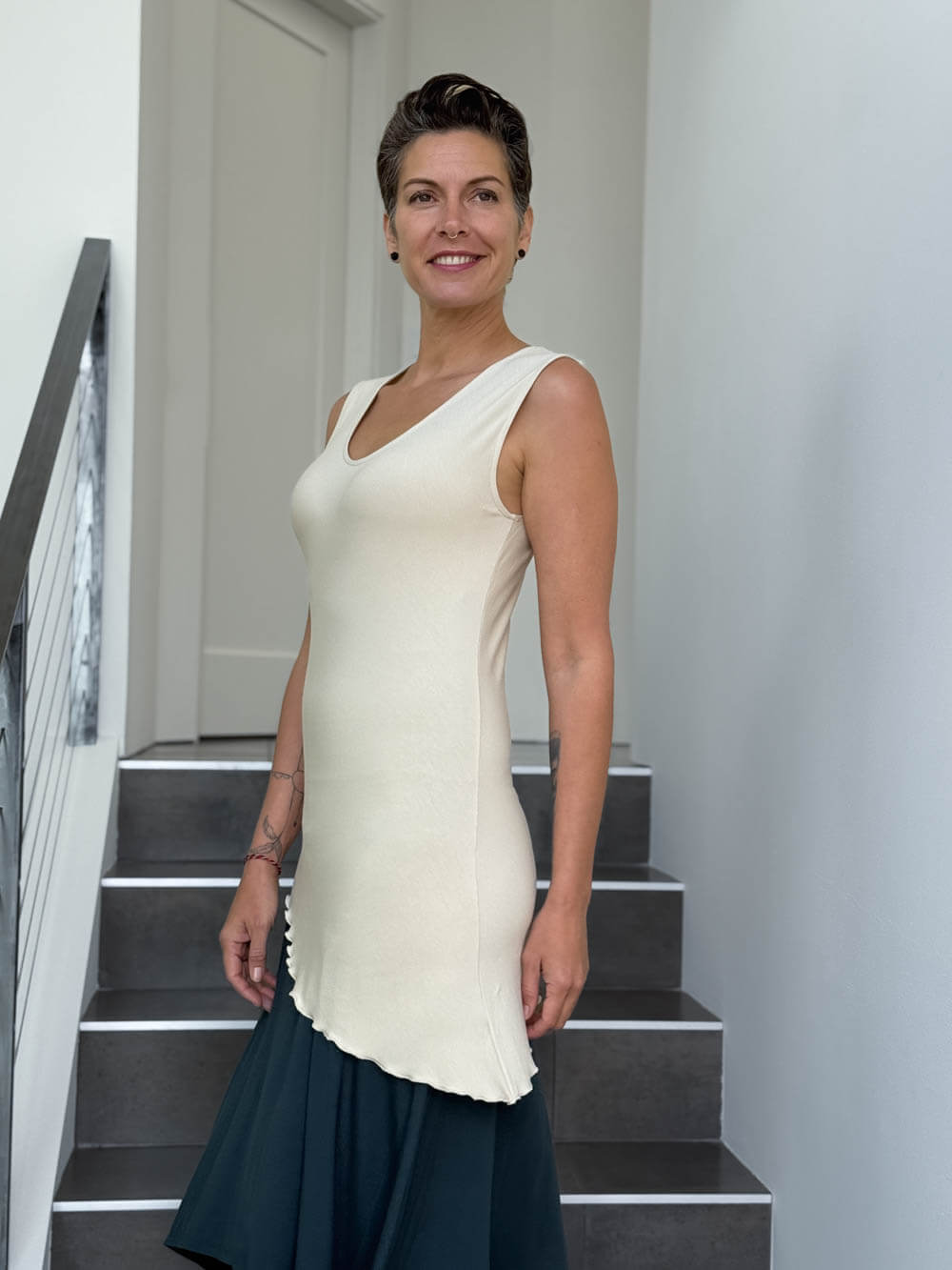 caraucci sleeveless scoop neck bias cut cream asymmetrical hem tunic #color_cream