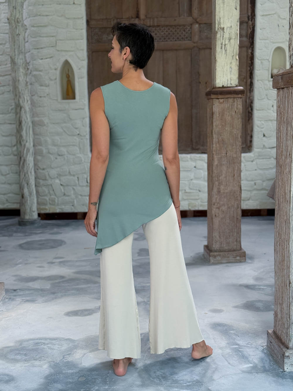 caraucci sleeveless scoop neck bias cut soft sage green asymmetrical hem tunic #color_moss