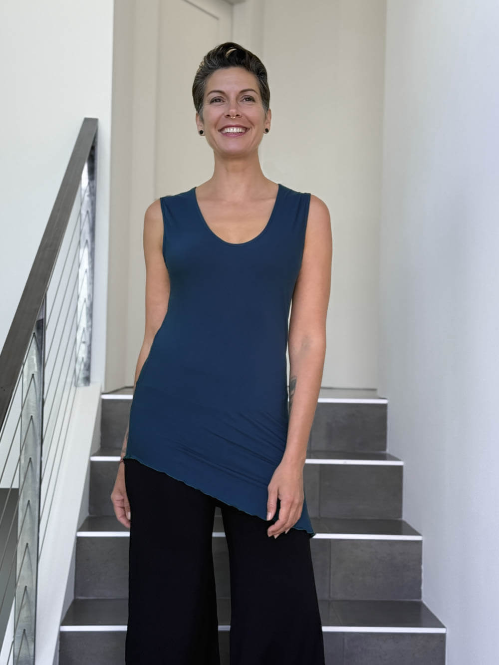 caraucci sleeveless scoop neck bias cut navy blue asymmetrical hem tunic #color_navy