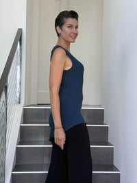 caraucci sleeveless scoop neck bias cut navy blue asymmetrical hem tunic #color_navy