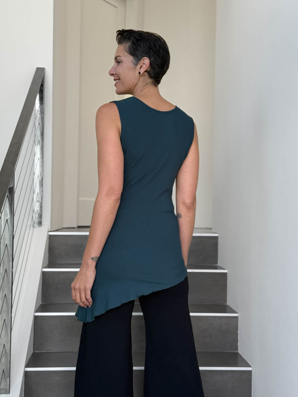 caraucci sleeveless scoop neck bias cut teal blue asymmetrical hem tunic #color_teal