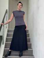 women's bamboo spandex stretchy long black skirt with two pockets #color_black