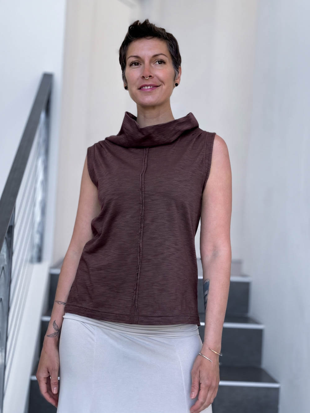 Front view of CARAUCCI Cotton Cowl Neck Tank in cocoa brown with draped neckline, center seam detail and cream skirt. #color_cocoa