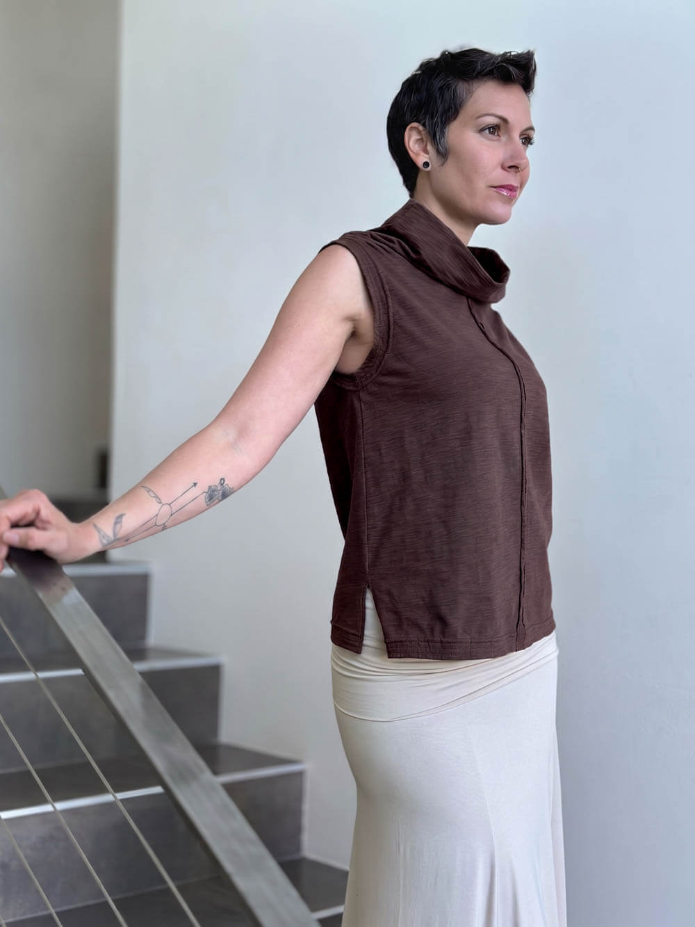 Side view of CARAUCCI Cotton Cowl Neck Tank in cocoa brown showing the relaxed fit, draped cowl neckline and side slit. #color_cocoa