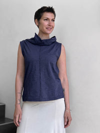 front view of CARAUCCI Cotton Cowl Neck Tank in denim navy blue with draped neckline, center seam detail and cream skirt. #color_midnight