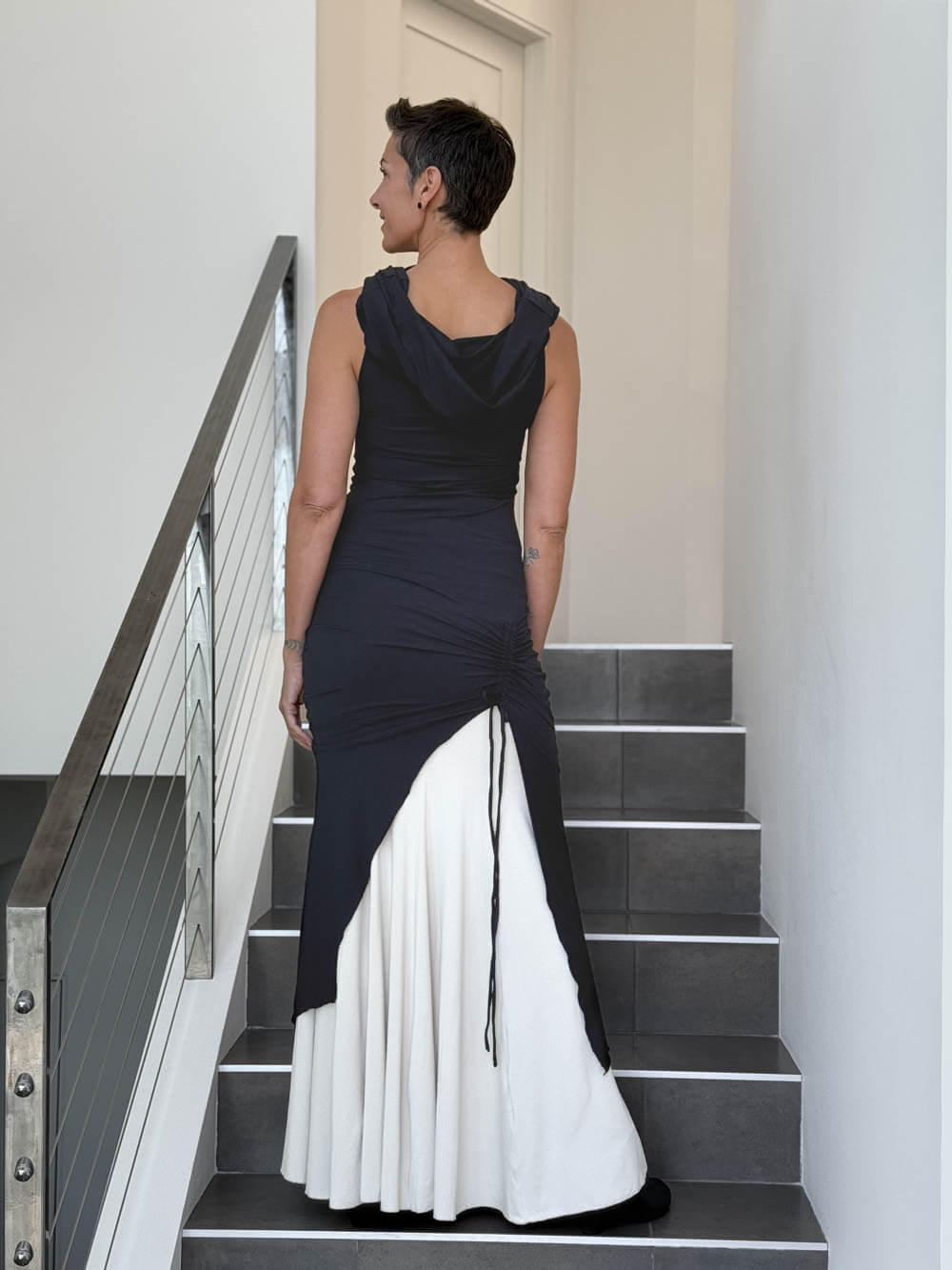 caraucci women's black full length tunic with adjustable side ruching and a loose cowl neck that can be worn as a hood or over the shoulders #color_black