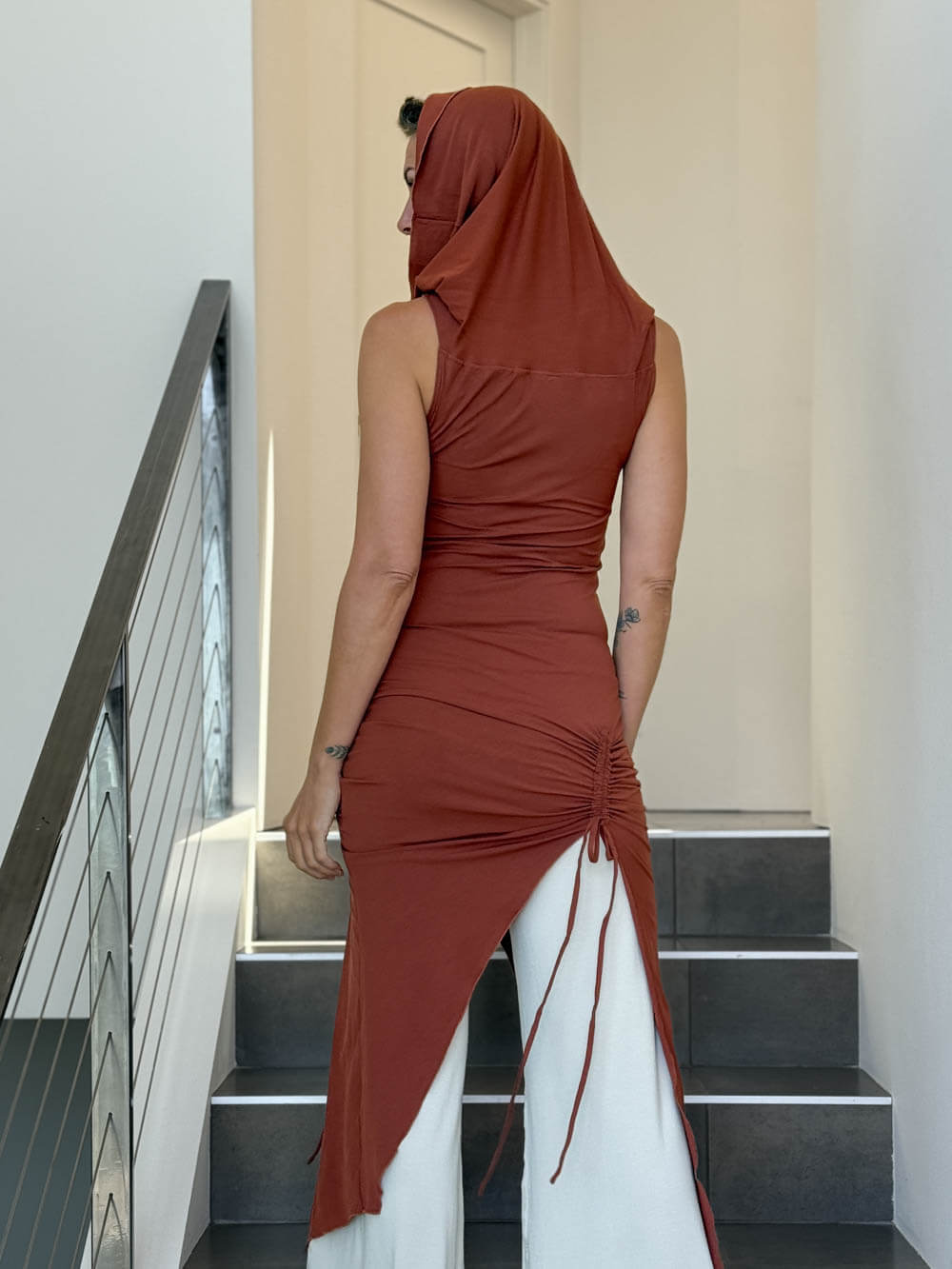 caraucci women's burnt orange full length tunic with adjustable side ruching and a loose cowl neck that can be worn as a hood or over the shoulders #color_copper