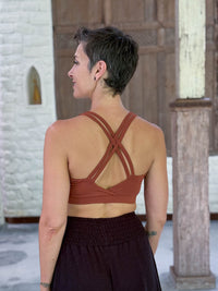 caraucci stretchy full coverage burnt orange yoga bra top with criss cross back straps #color_copper