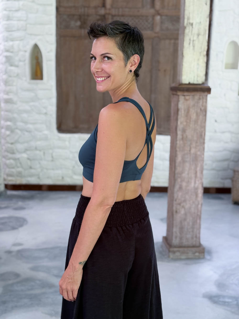 caraucci stretchy full coverage teal blue yoga bra top with criss cross back straps #color_teal