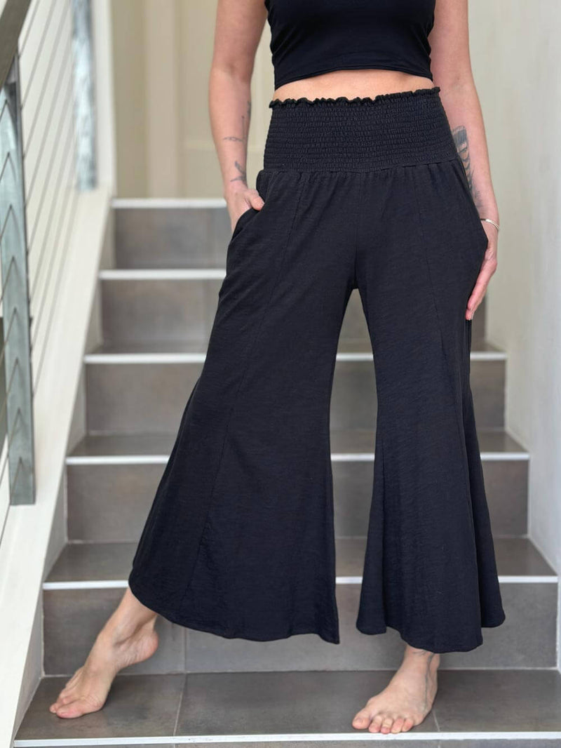 caraucci black cotton cropped pocket flare pants with smocked stretchy waistband #color_black