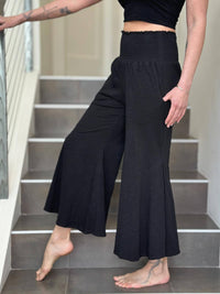 caraucci black cotton cropped pocket flare pants with smocked stretchy waistband #color_black