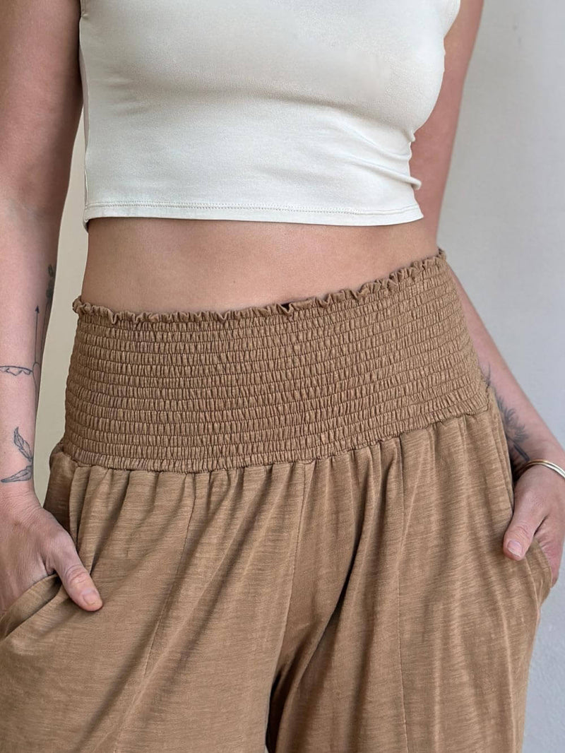 caraucci golden brown cotton cropped pocket flare pants with smocked stretchy waistband #color_camel