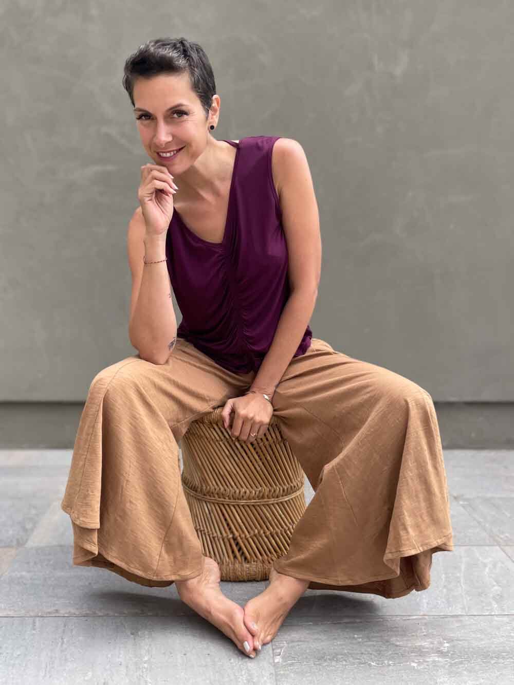 caraucci golden brown cotton cropped pocket flare pants with smocked stretchy waistband #color_camel