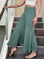 caraucci sage green cotton cropped pocket flare pants with smocked stretchy waistband #color_matcha