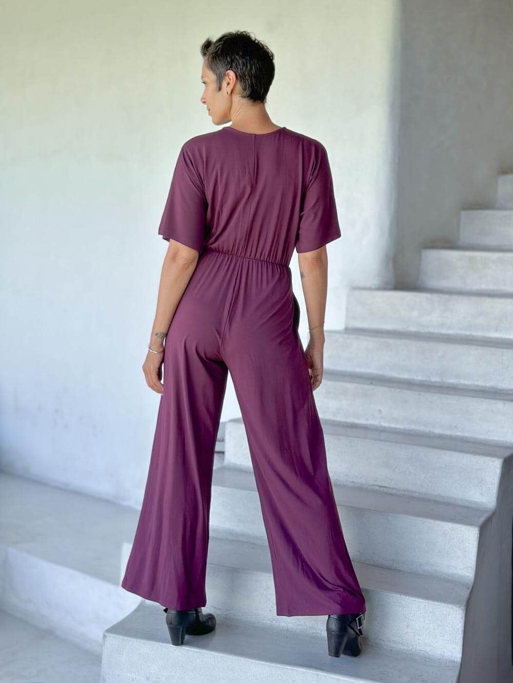 caraucci purple one-piece v neck pantsuit with pockets and flare legs #color_jam