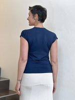 caraucci plant-based rayon stretch jersey navy blue cross over neckline top #color_navy