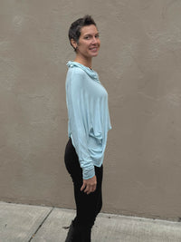 women's natural lightweight rayon jersey cowl neck sky blue loose fit top with thumbholes #color_canal-blue