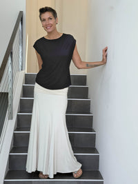 CARAUCCI Erna top in black lightweight rayon jersey with cap sleeves and draped neckline #color_black