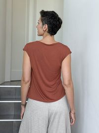 CARAUCCI Erna top in soft orange lightweight rayon jersey with cap sleeves and draped neckline #color_copper