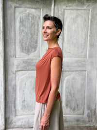 CARAUCCI Erna top in soft orange lightweight rayon jersey with cap sleeves and draped neckline #color_copper