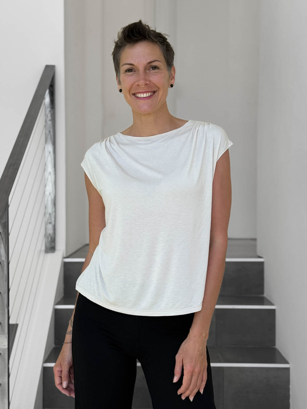 CARAUCCI Erna top in soft cream lightweight rayon jersey with cap sleeves and draped neckline #color_cream