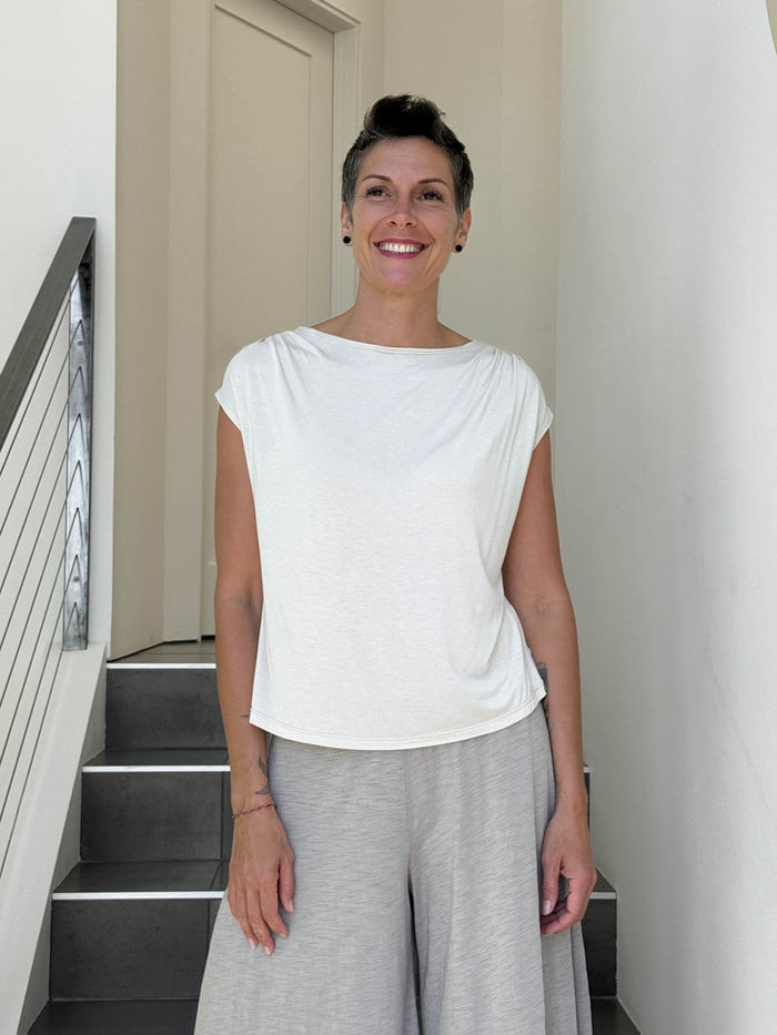 CARAUCCI Erna top in soft cream lightweight rayon jersey with cap sleeves and draped neckline #color_cream
