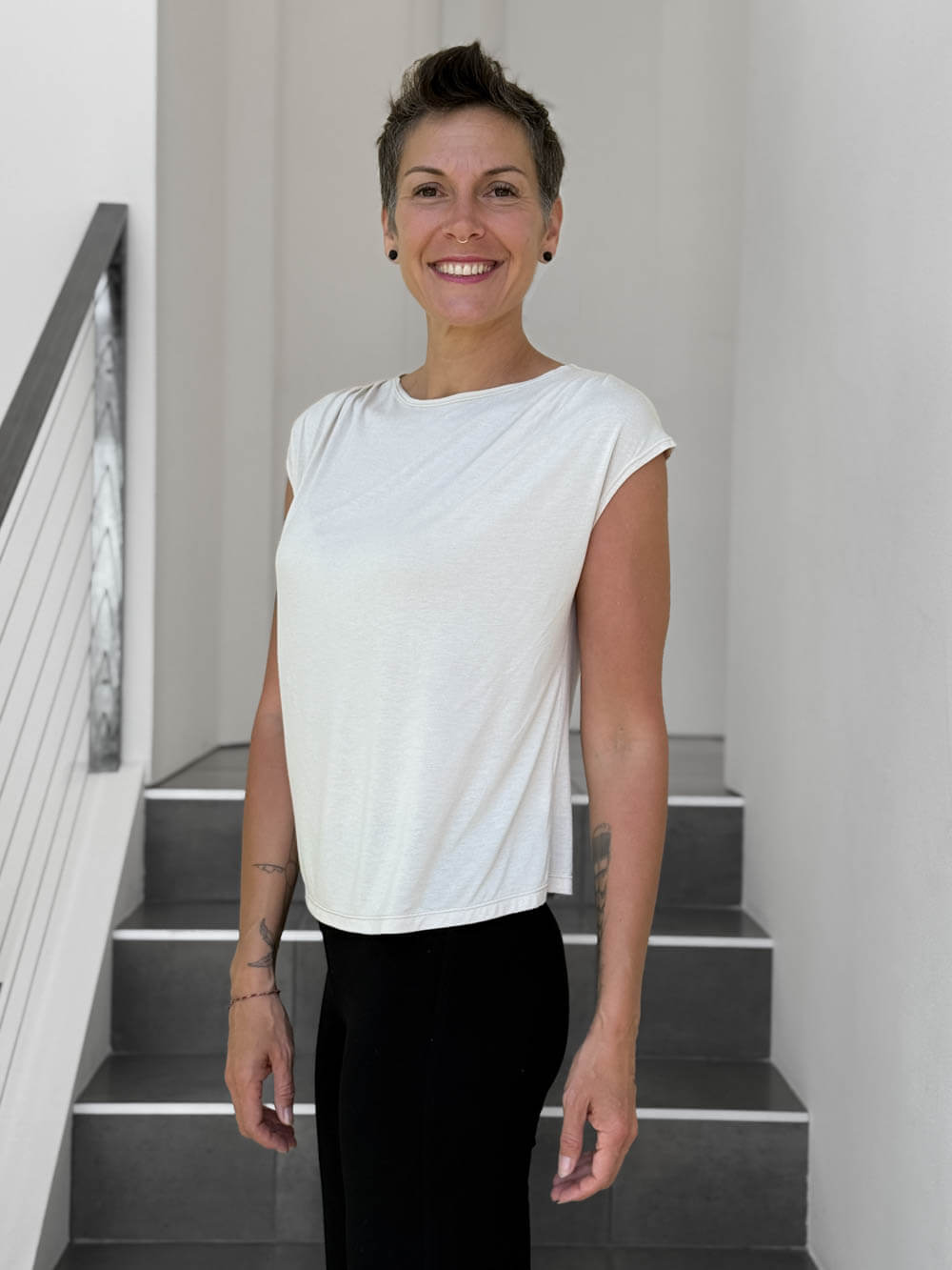 CARAUCCI Erna top in soft cream lightweight rayon jersey with cap sleeves and draped neckline #color_cream