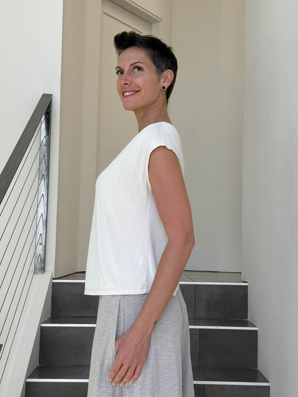 CARAUCCI Erna top in soft cream lightweight rayon jersey with cap sleeves and draped neckline #color_cream