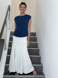 CARAUCCI Erna top in navy blue lightweight rayon jersey with cap sleeves and draped neckline #color_navy