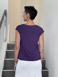 CARAUCCI Erna top in purple lightweight rayon jersey with cap sleeves and draped neckline #color_plum